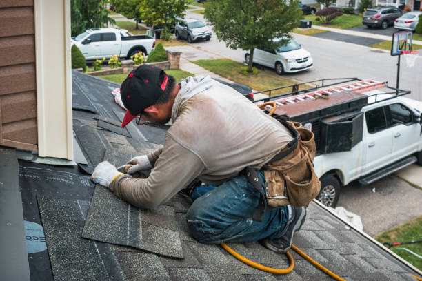 Professional Roof Replacement technician working in Briggsdale, CO